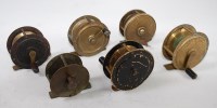 Lot 606 - An early 20th century brass trout fly reel,...