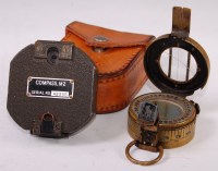 Lot 317 - A WW II brass cased Mk III prismatic marching...
