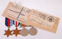 Lot 321 - A WW II group of four to include 1939-45 Star,...