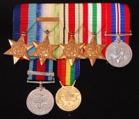 Lot 342 - A WW II group of seven to include 1939-45 Star,...