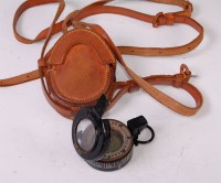 Lot 351 - A WW II Mk III brass cased military compass,...