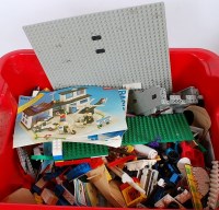 Lot 3254 - A box of mixed, loose Lego, some instructions...
