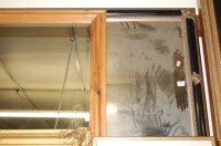Lot 1013 - A reproduction gilt and ebonised framed wall...