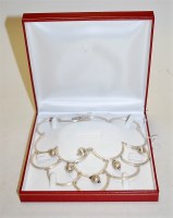Lot 475 - A ladies silver necklet having textured silver...