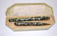 Lot 493 - A gents Unique Deluxe faux marble cased...