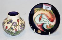 Lot 164 - A modern Moorcroft pin dish, on a blue ground...