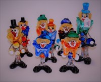 Lot 558 - A collection of eight Murano glass clown figures