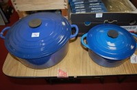 Lot 574 - A Le Creuset twin handled cooking vessel and...