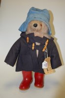 Lot 608 - A Paddington bear **in a blue felt hat, with...