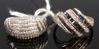 Lot 376 - A modern 9ct white gold and multi-diamond set...
