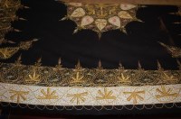 Lot 619 - An Indian gold thread embroidered floral...