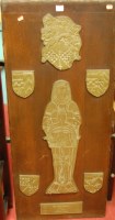 Lot 1067 - A reproduction panel with relief metal mounts...