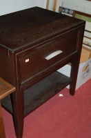 Lot 1074 - A modern elm finish coffee table; and a modern...