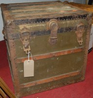 Lot 1084 - A metal bound canvas trunk