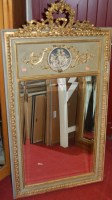 Lot 1089 - A giltwood and gesso wall mirror in the Adam...