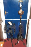 Lot 1104 - A circa 1900 black painted wrought iron...