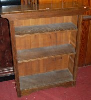 Lot 1105 - A 1930s oak freestanding open bookshelf, width...