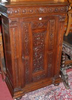 Lot 1109 - A circa 1900 French low relief carved oak...