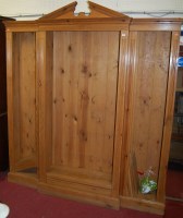 Lot 1114 - A pine breakfront freestanding open bookshelf,...