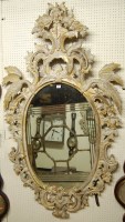 Lot 1127 - A large silvered and gilt floral decorated...