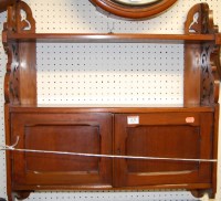 Lot 1132 - An Edwardian walnut double door hanging wall...