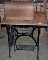 Lot 1135 - A Singer treadle sewing machine