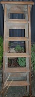 Lot 1138 - An early 20th century pitched pine decorator's...