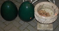 Lot 1140 - A reconstituted stone pedestal planter,...