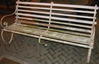 Lot 1143 - A 19th century wrought iron and white painted...