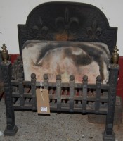 Lot 1144 - A Mediaeval style cast iron fire basket, with...