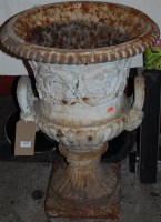 Lot 1148 - A Victorian cast iron pedestal campagna urn...