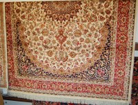 Lot 1154 - A Keshan woollen carpet, 230 x 160cm