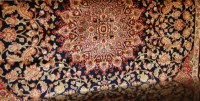 Lot 1157 - A Keshan woollen rug 190 x 140cm