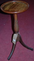 Lot 1168 - A low relief carved mahogany dish top pedestal...