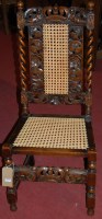 Lot 1172 - A circa 1900 Carolean style walnut cane back...