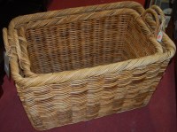 Lot 1179 - A graduated set of two contemporary wicker...