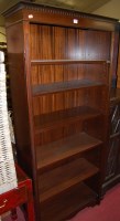 Lot 1180 - A reproduction mahogany freestanding open...