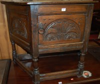 Lot 1191 - A 17th century style joined oak single door...