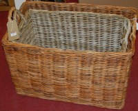 Lot 1195 - A graduated set of two wicker twin handled...