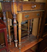 Lot 1196 - A Victorian stained pine single drawer side...