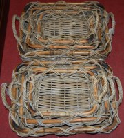 Lot 1208 - Two sets of three graduated wicker shallow...