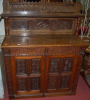 Lot 1218 - A late 19th century low relief carved oak...