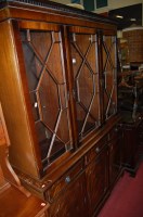 Lot 1225 - A reproduction mahogany bookcase cupboard...