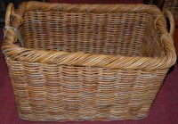 Lot 1228 - A contemporary wicker twin handled carrying...