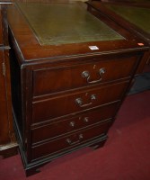 Lot 1229 - A reproduction mahogany and gilt tooled green...