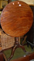 Lot 1235 - An early 19th century mahogany circular tilt...