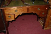 Lot 1237 - An early 20th century mahogany and gilt tooled...