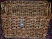 Lot 1240 - A graduated set of two contemporary wicker...