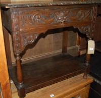 Lot 1242 - A low relief carved oak single drawer side...