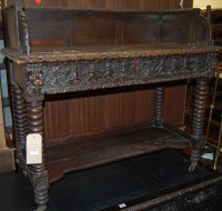 Lot 1245 - A late 19th century Continental heavily carved...